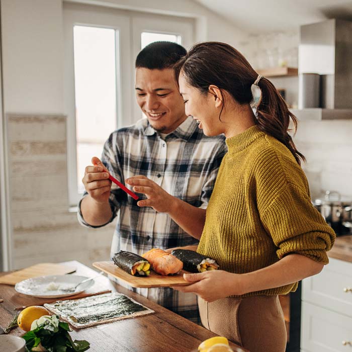 couple-cooking-in-kitchen